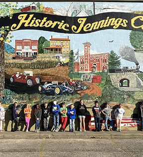 Students in front of historic Jennings County mural